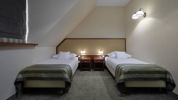 Фото номера Двухместный номер с 2 отдельными кроватями Отель Hotel Poledno г. Poledno 2